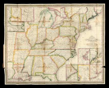 Mitchells Travellers Guide Through the United States., Samuel Augustus Mitchell. Phila., 1834 - 12mo, original leather wallet-style binding. With folding colored map. Minor
faults. With patriotic sticker on front pastedown. The maps wester