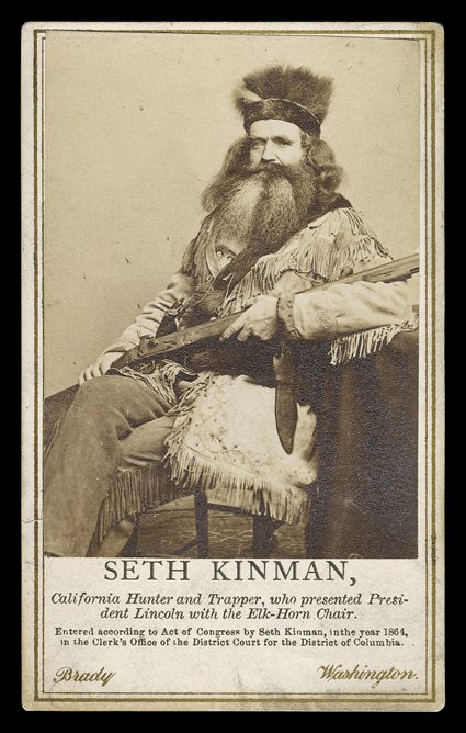 [Mountain Man Seth Kinman] Delightful carte-de-visite Photograph of Seth Kinman (1815-88), a California 49er, hunter and trapper, who embodied the popular look of the mountain
man. By Mathew Brady of Washington, ca. 1865. With 2-cent revenu