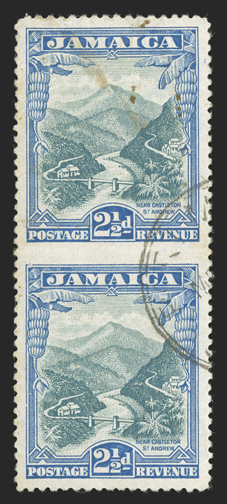 S.G. 112a, 1932 2½d Turquoise-blue and ultramarine, imperforate between, an exceedingly rare used vertical pair, well centered, good colors and neatly cancelled, light creases
and a pinhole, top stamp with some stained spots, very fine appearanc