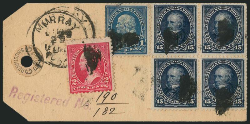 15c Dark Blue (274).> Block of four, used with 1c Blue (264) and 2c Red (279B) and tied by corks on registered bank tag to Wallace Idaho, bold Murray Idaho circular datestamp, few small flaws incl. bottom pair
horizontal crease prior to use, Very Fin